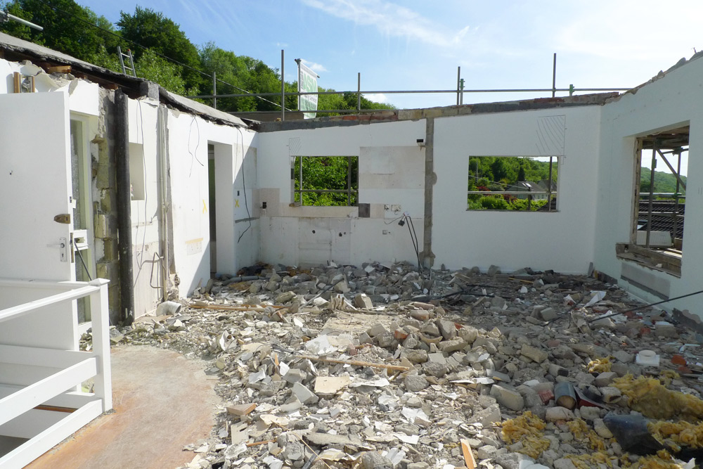 Demolition - Upper floor, roof and internal walls removed