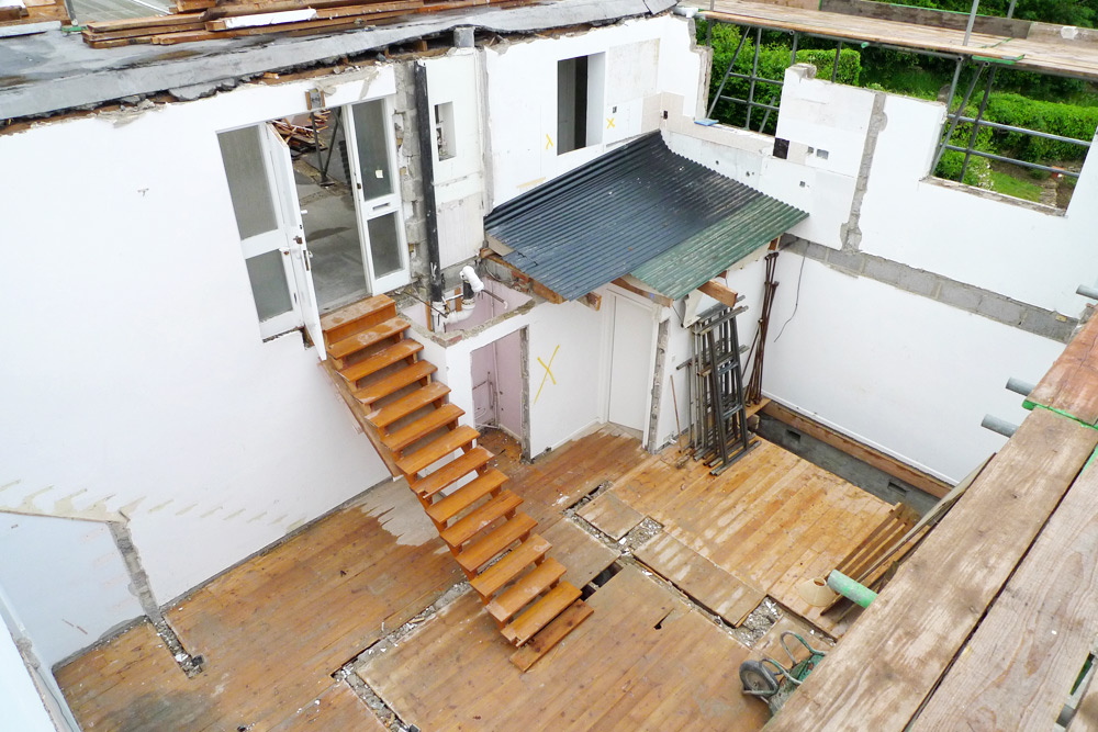 Demolition - View of interior over two floors, upper floor & internal walls removed