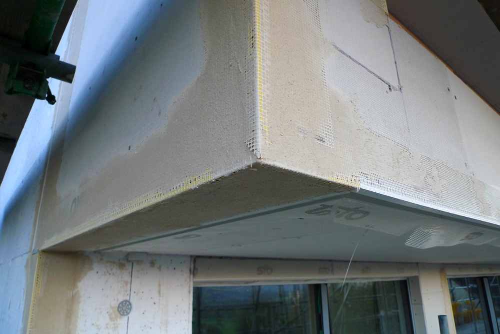 EWI & rainscreen cladding - Corner detail with render carrier board, glass fibre mesh and beading