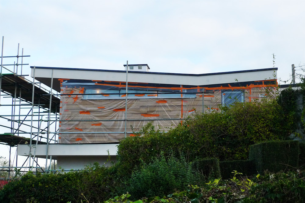 EWI & rainscreen cladding - Render carrier board roof & balcony perimeters with render undercoat & glass fibre mesh