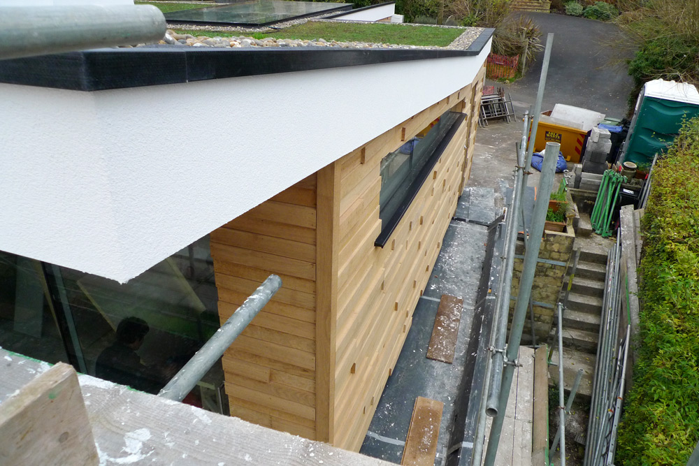 EWI & rainscreen cladding - Rendered roofline