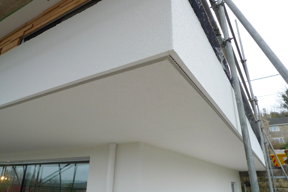 EWI & rainscreen cladding - Rendered corner