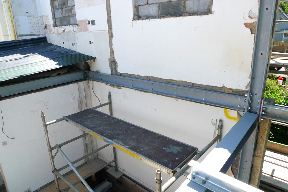 Steelwork - Steel frame resin-bolted to the masonry side walls